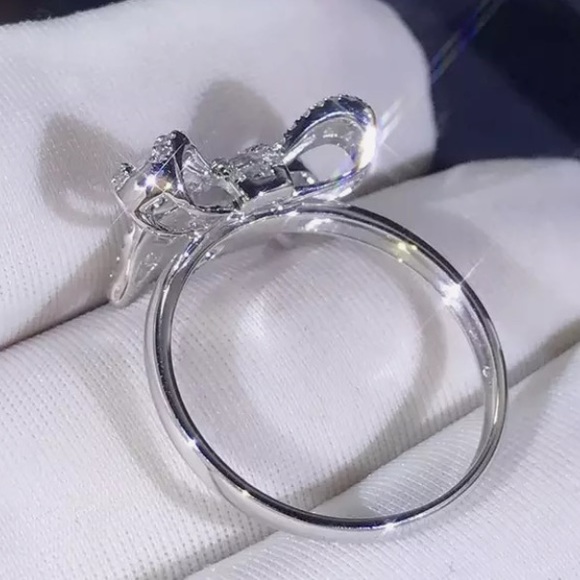 THIS ABSOLUTELY STUNNING PAVE CRYSTALS RING WILL TURN HEADS WHEREVER YOU WEAR IT - Picture 3 of 8